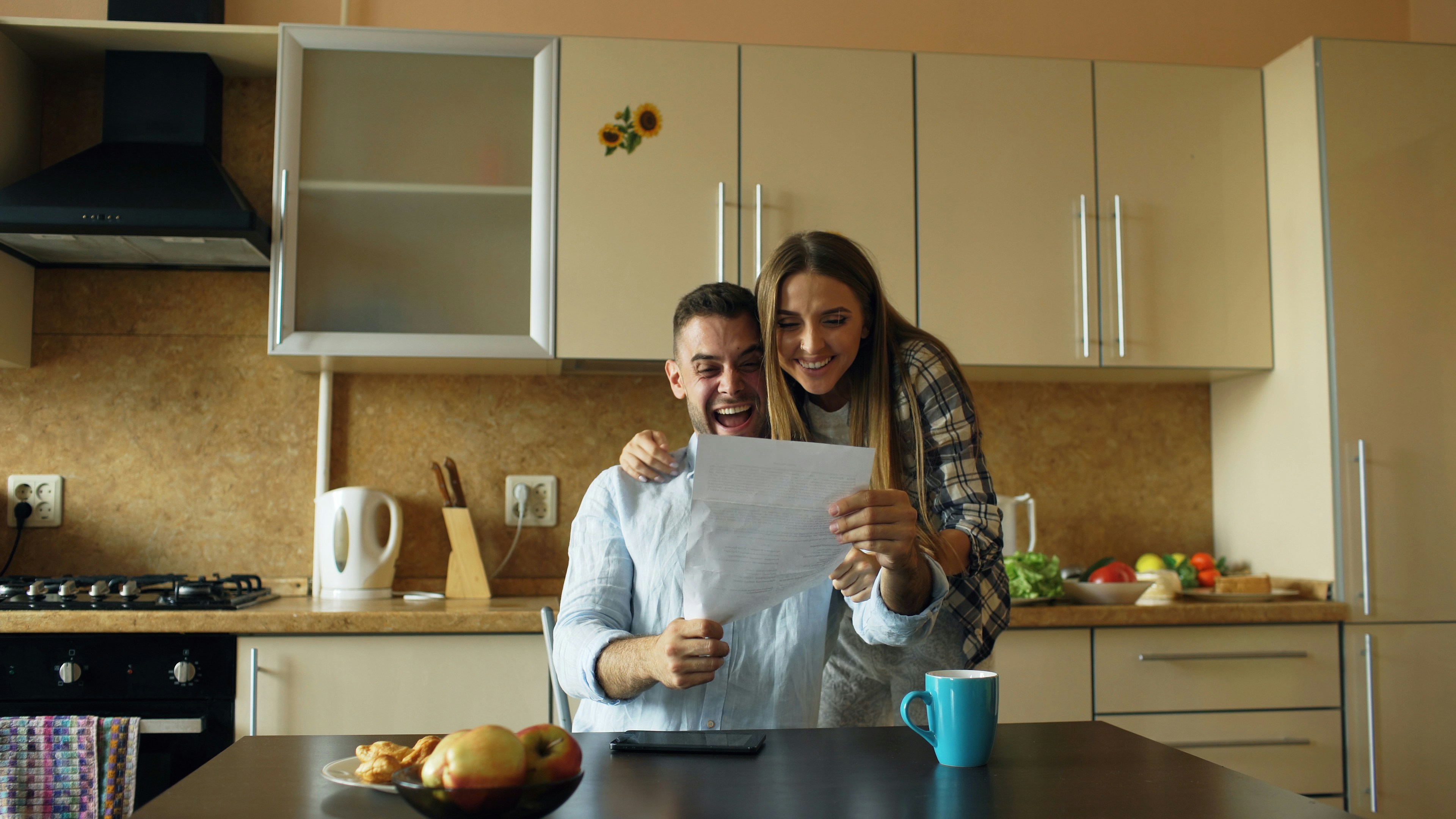 Couple reviewing savings, accounts, and financial goals during a money checkup